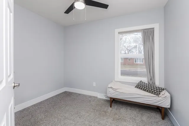 a bathroom with a sink and a window