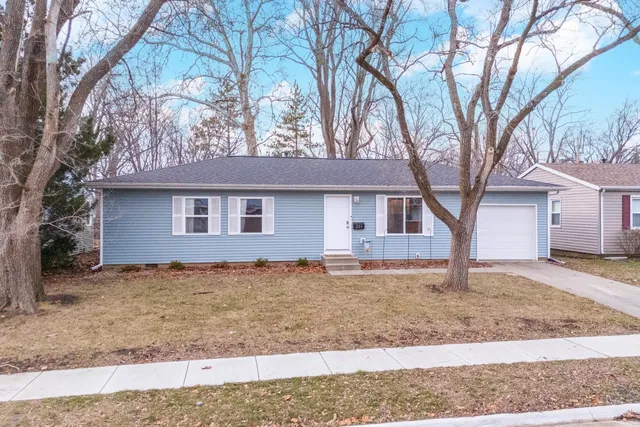 front view of a house and a yard