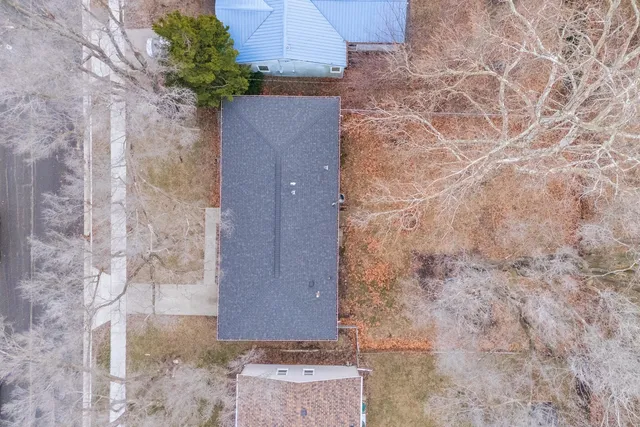 a brick building with a yard