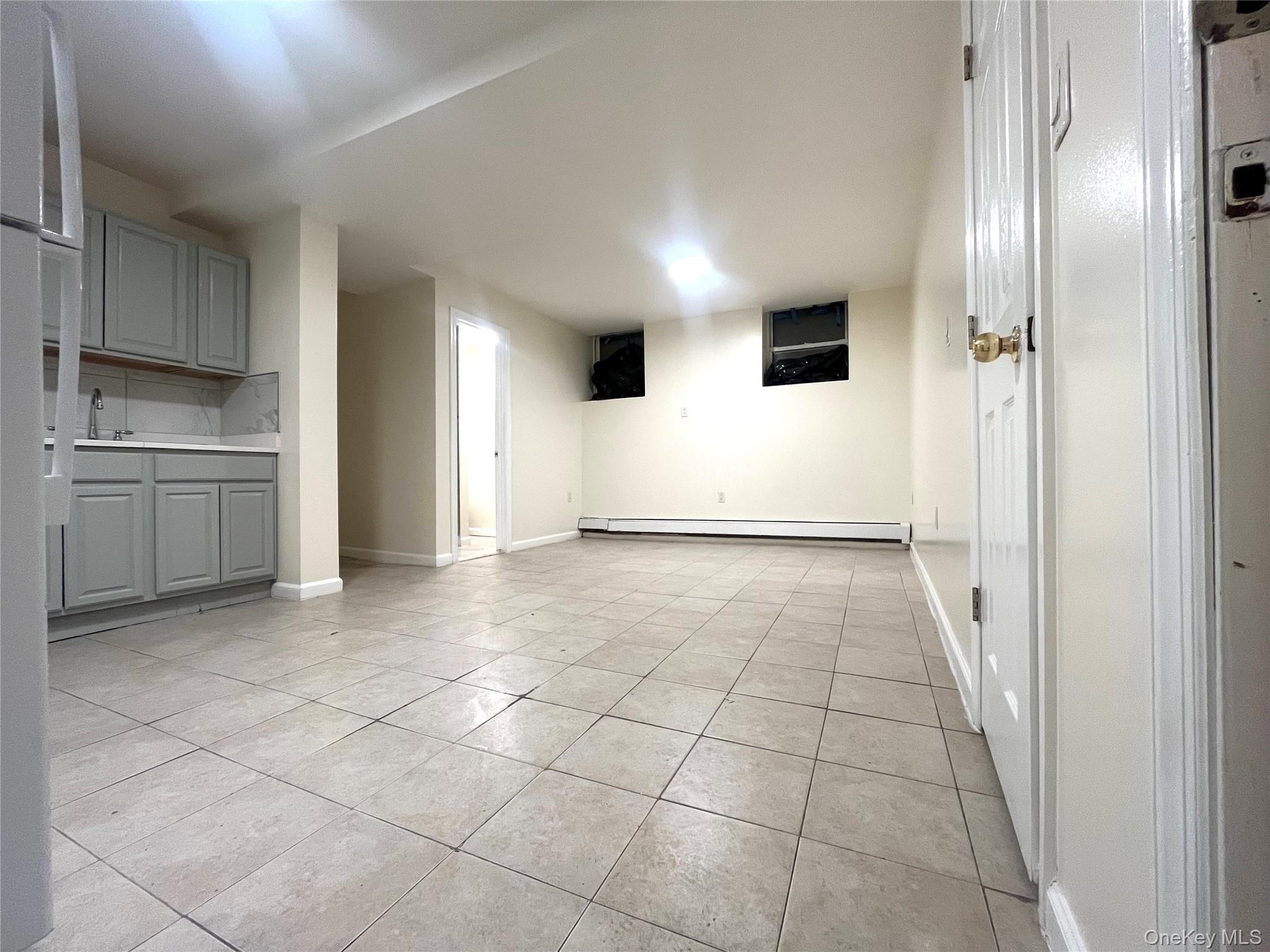 849 Montgomery Street Brooklyn, NY 11213 - Photo 3 of 7 a view of a hallway to rooms