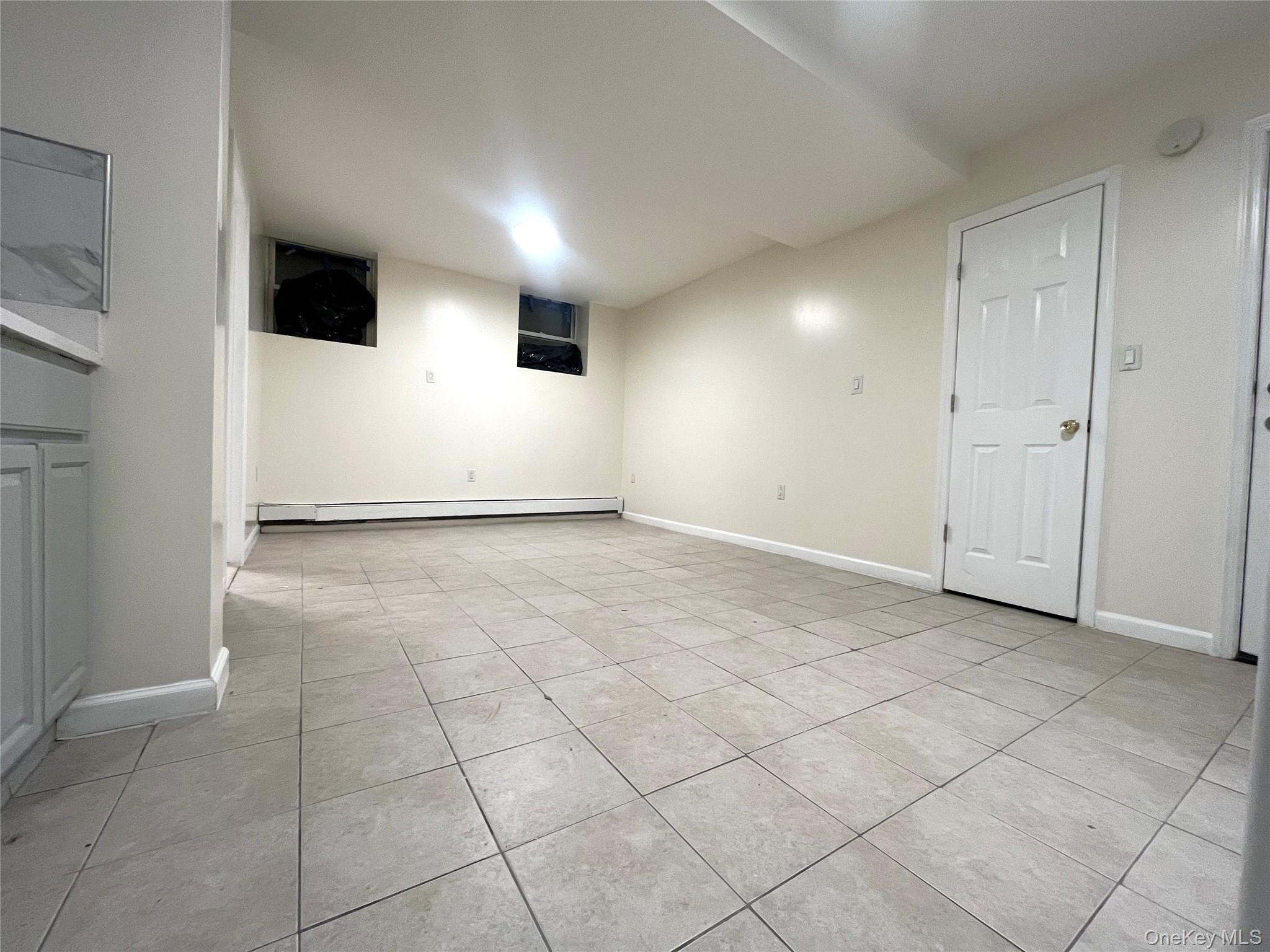 849 Montgomery Street Brooklyn, NY 11213 - Photo 4 of 7 a view of an empty room