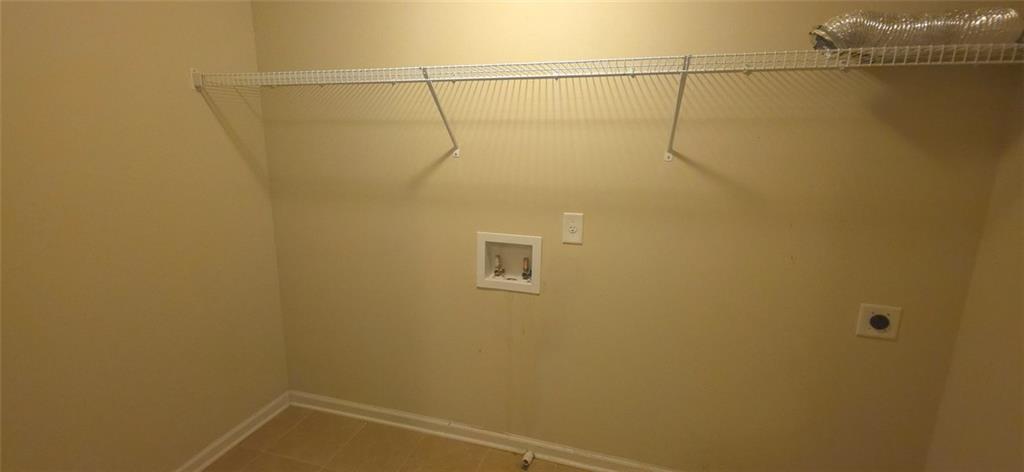 539 Broughton Drive Canton, GA 30114 - Photo 8 of 14 a bathroom with a shower