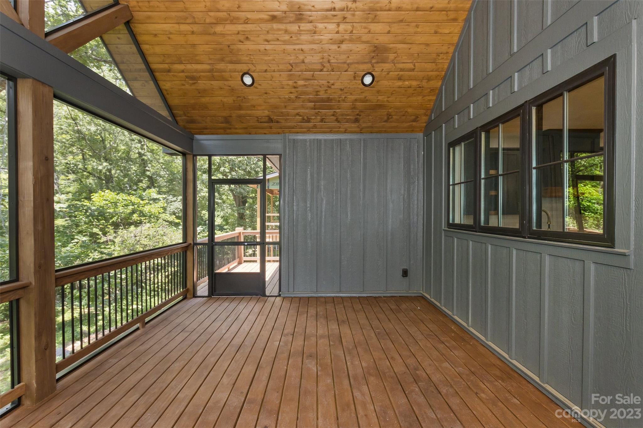 159 Gashes Creek Road Asheville, NC 28805 - Photo 16 of 48 a view of a balcony with wooden floor