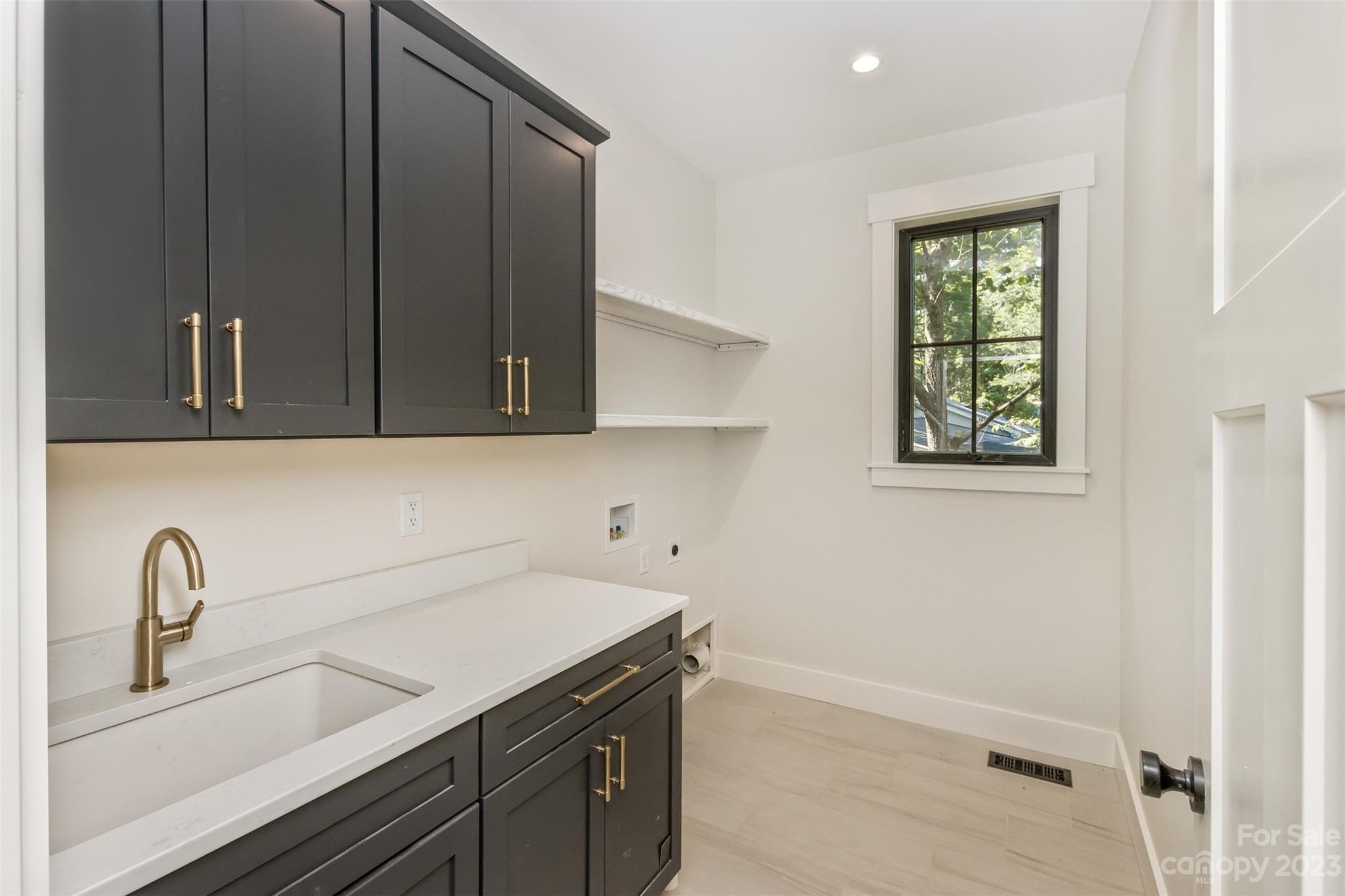 159 Gashes Creek Road Asheville, NC 28805 - Photo 23 of 48 a bathroom with a sink and a mirror