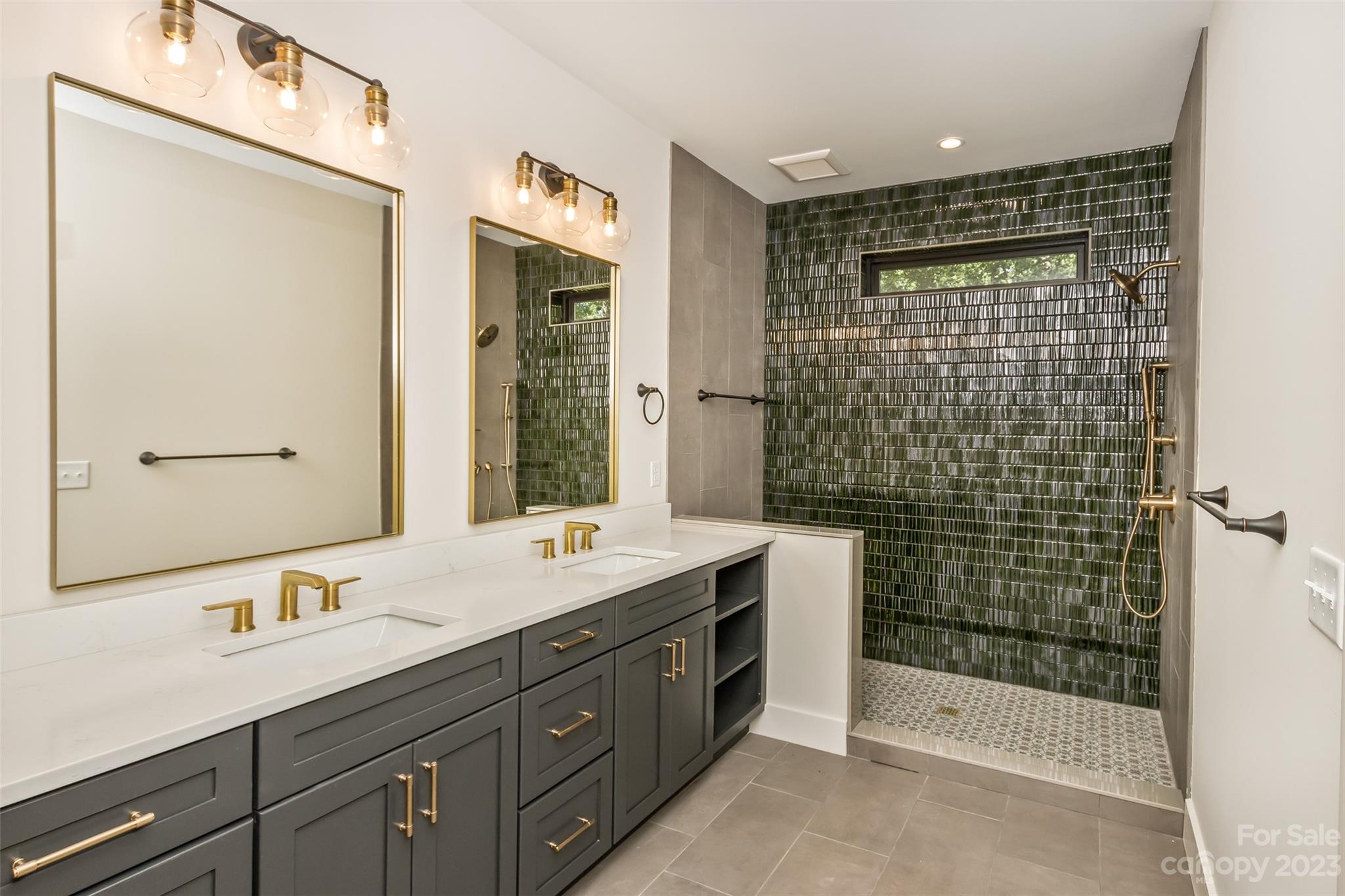 159 Gashes Creek Road Asheville, NC 28805 - Photo 28 of 48 a bathroom with a double vanity sink mirror and shower