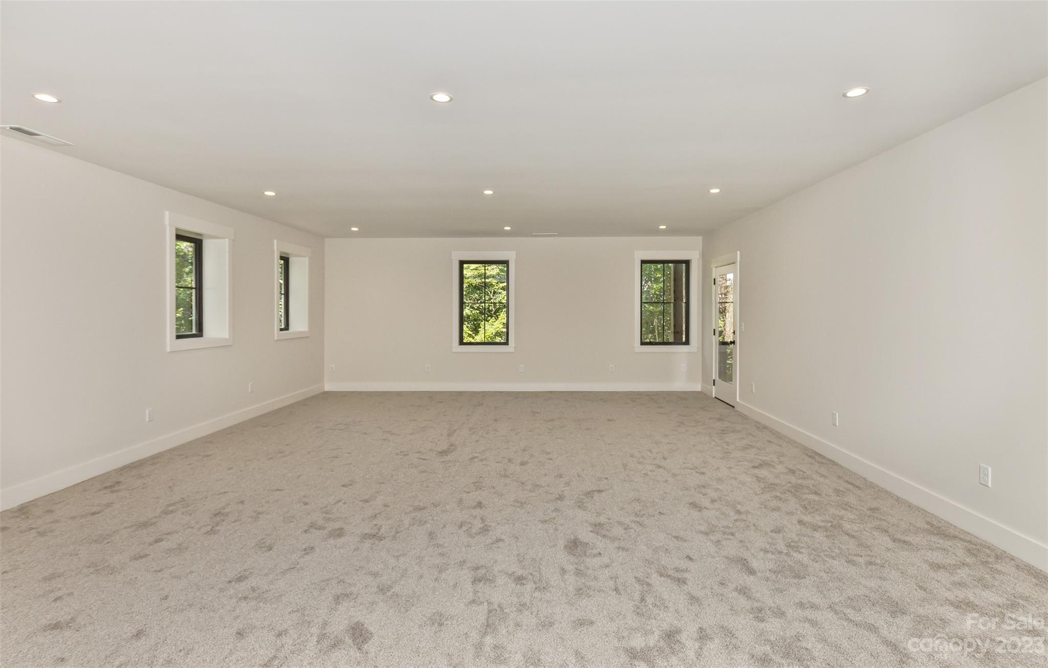 159 Gashes Creek Road Asheville, NC 28805 - Photo 38 of 48 an empty room with windows