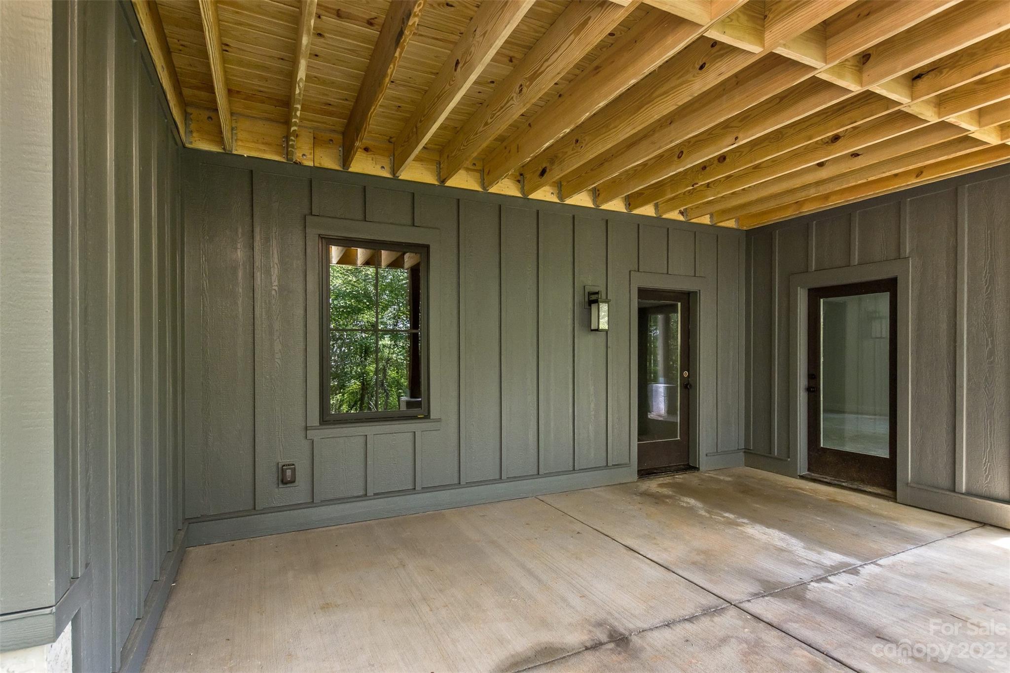 159 Gashes Creek Road Asheville, NC 28805 - Photo 43 of 48 a view of a room with wooden walls