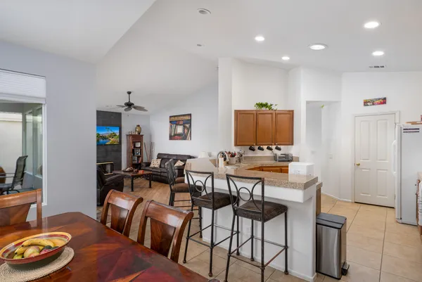 a view of a dining room with furniture