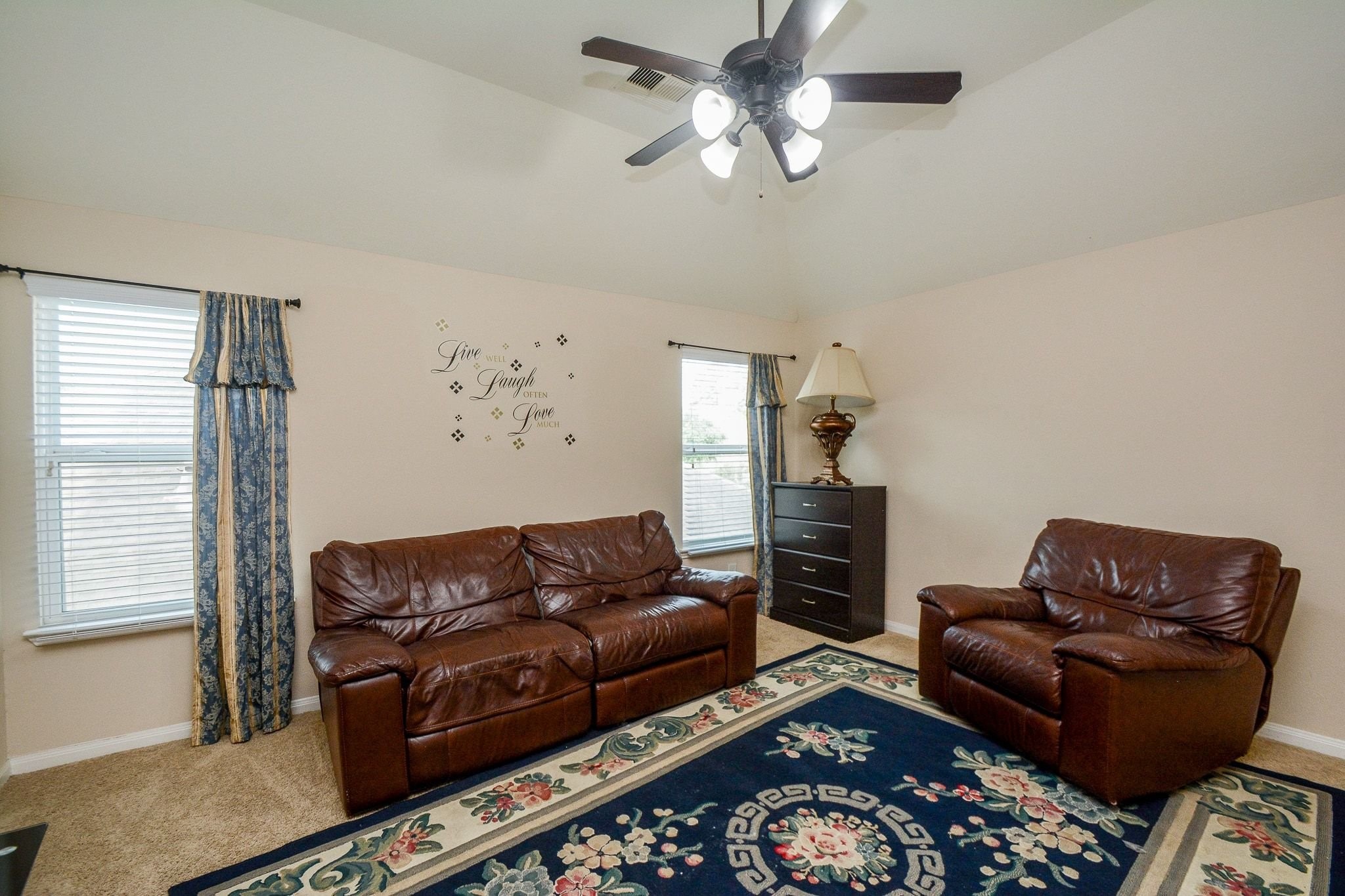 7046 Sliding Rock Circle Spring, TX 77379 - Photo 27 of 41 This inviting game room features ample natural light, plush leather seating, and a cozy atmosphere perfect for relaxation and entertainment.