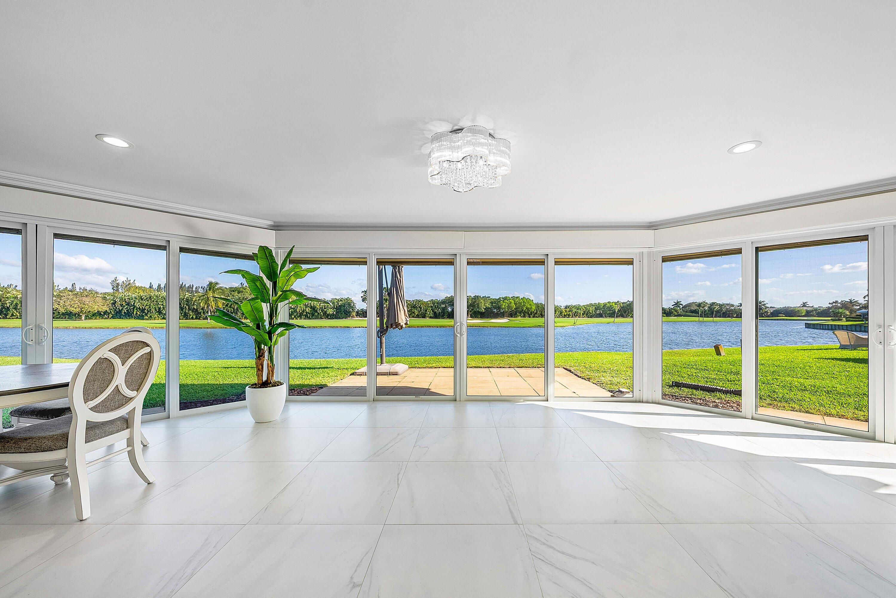 322 Cedar Key Circle Atlantis, FL 33462 - Photo 30 of 55 a view of swimming pool with a backyard and furniture