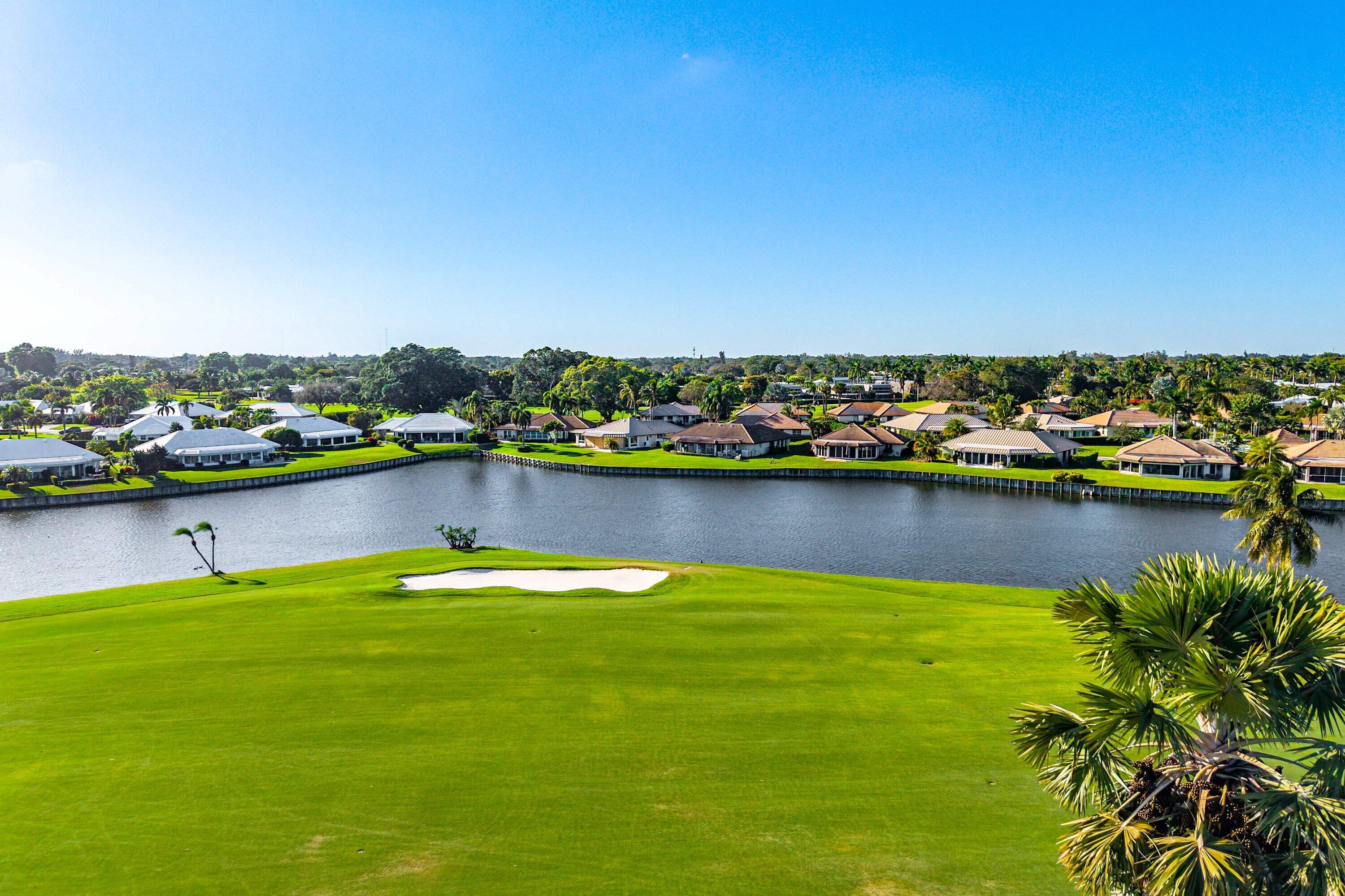 322 Cedar Key Circle Atlantis, FL 33462 - Photo 44 of 55 a view of a city with a lake view