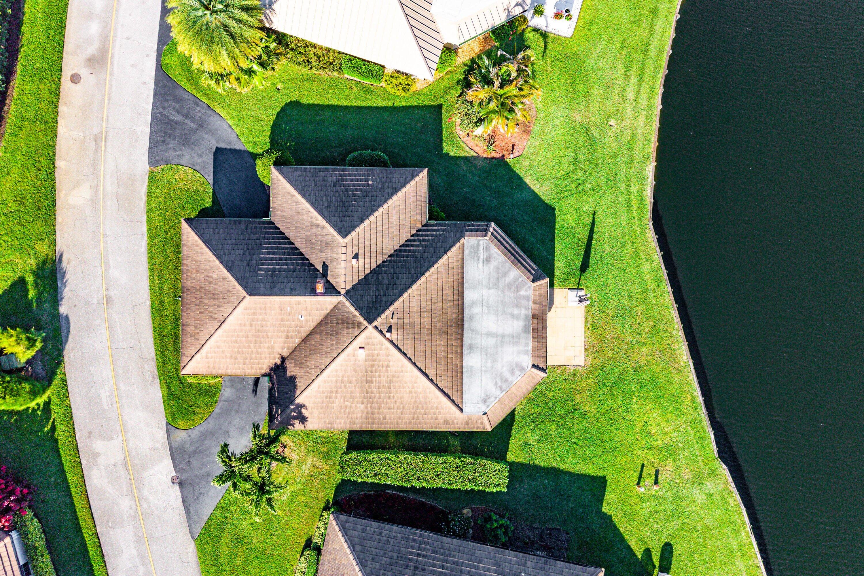 322 Cedar Key Circle Atlantis, FL 33462 - Photo 47 of 55 an aerial view of a house