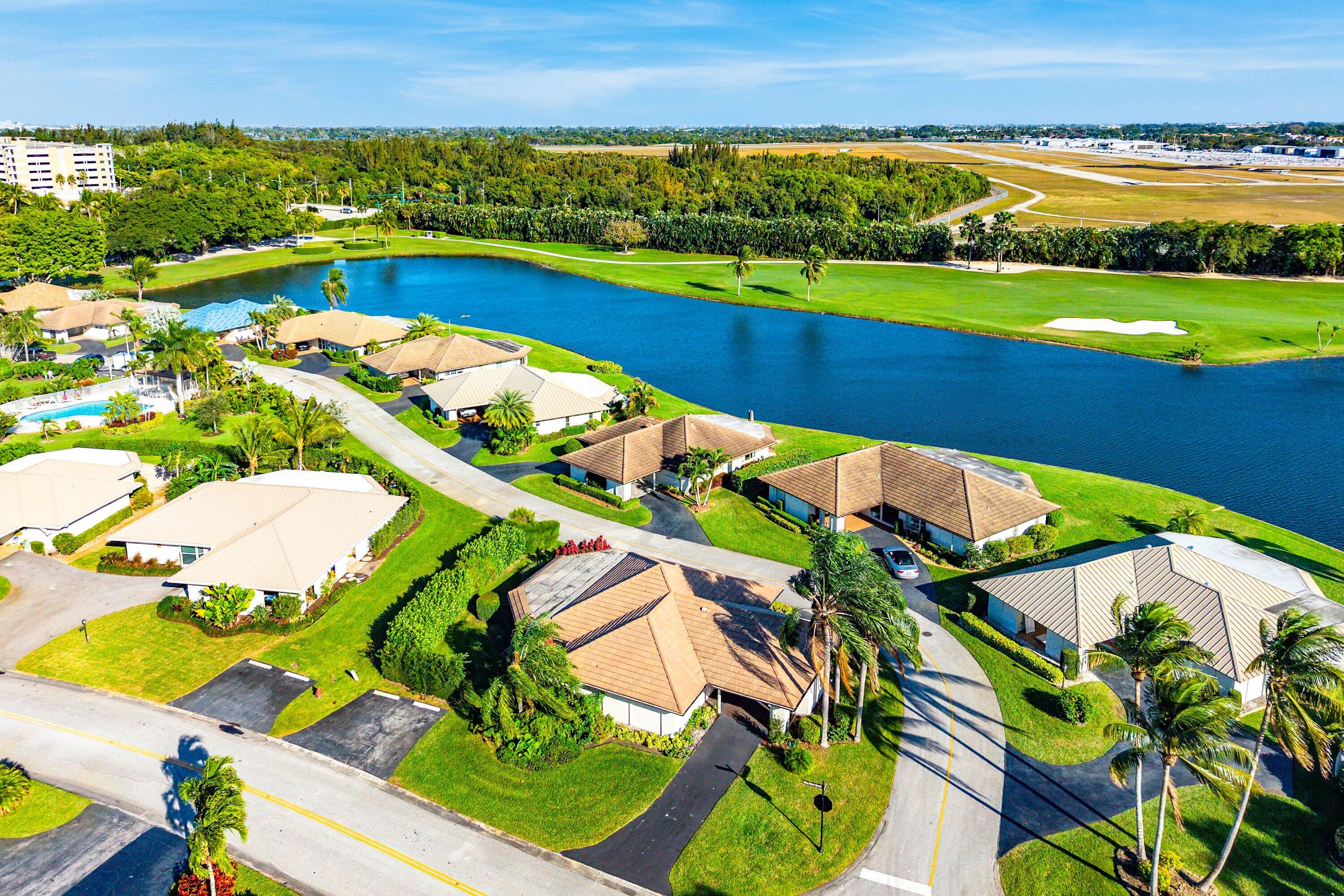 322 Cedar Key Circle Atlantis, FL 33462 - Photo 53 of 55 an aerial view of a chairs and table in the patio
