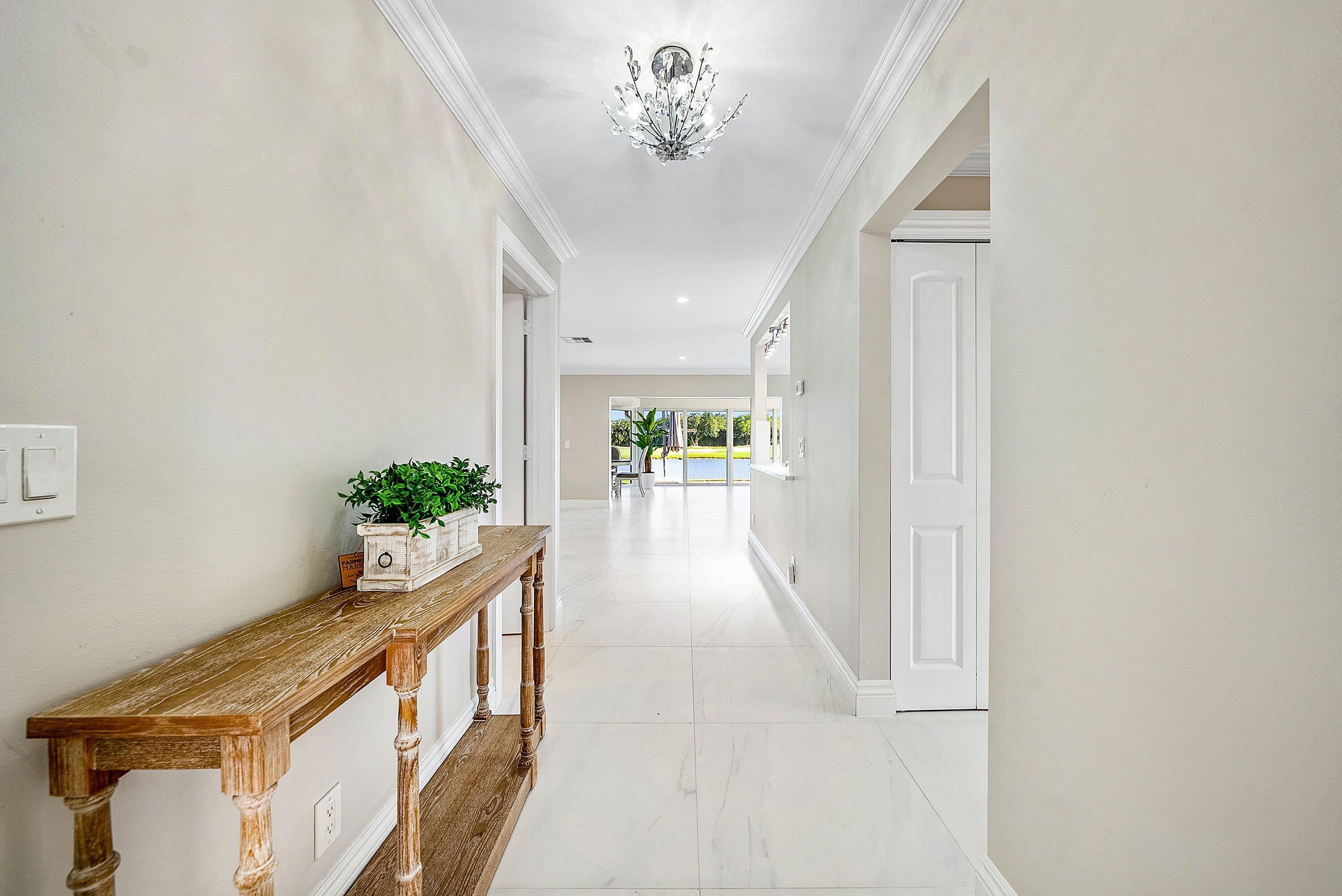 322 Cedar Key Circle Atlantis, FL 33462 - Photo 6 of 55 a view of an entryway