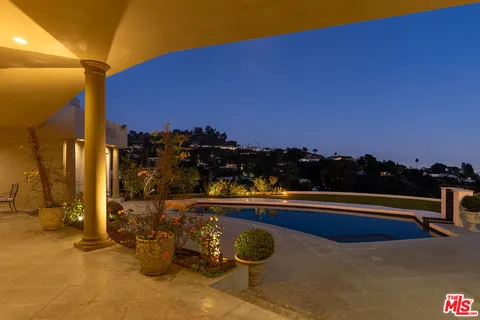 a view of a terrace with city view