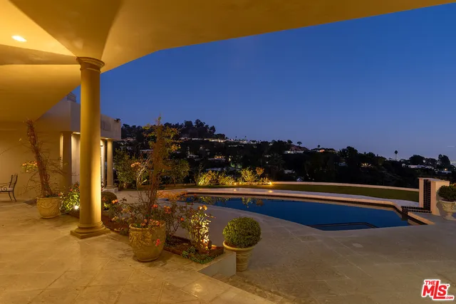 a view of a terrace with city view