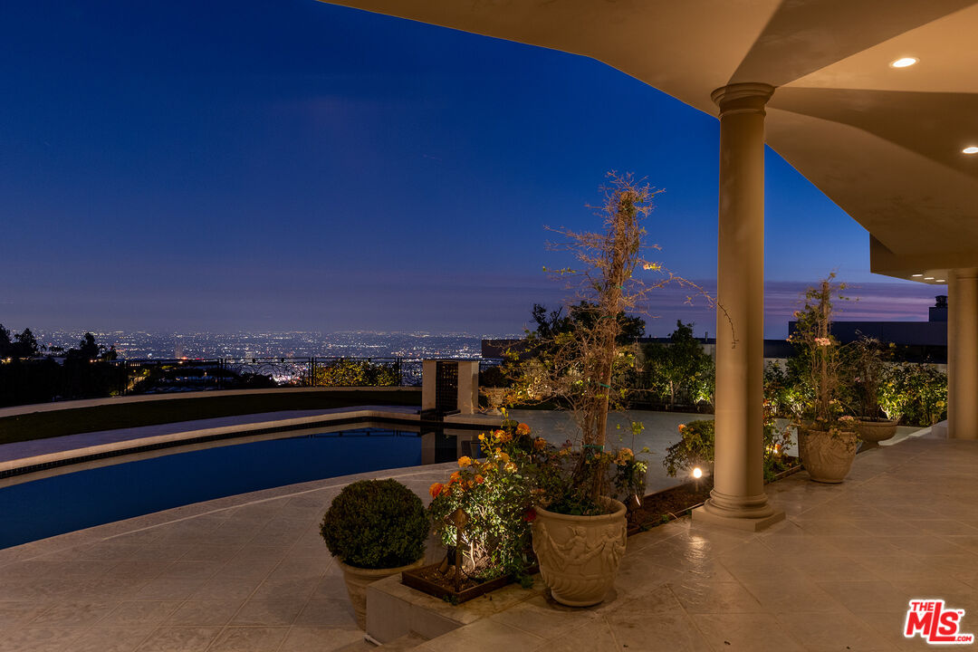 1630 Carla Ridge Beverly Hills, CA 90210 - Photo 19 of 22 a view of a terrace with city view