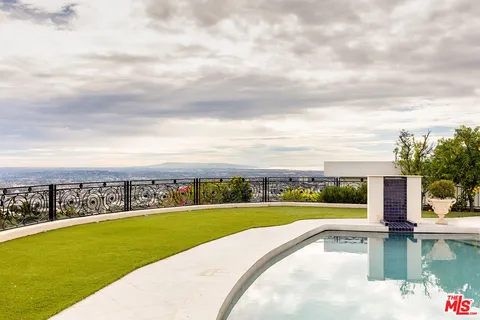 a view of a lake with a city view