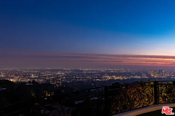 a view of a street with cars