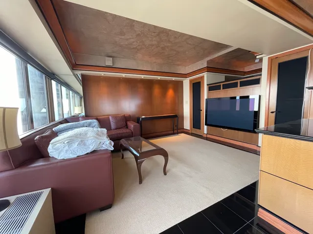 a kitchen with stainless steel appliances a refrigerator and a stove top oven