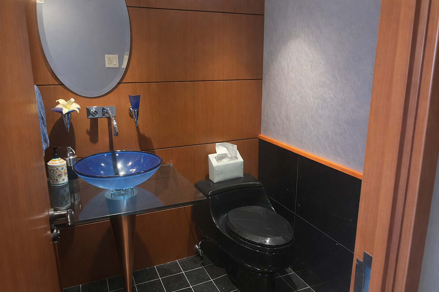 175 East Delaware Place, Unit 9007 Chicago, IL 60611 - Photo 13 of 27 a bathroom with a sink and a mirror