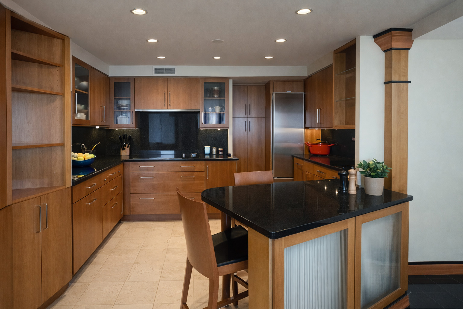 175 East Delaware Place, Unit 9007 Chicago, IL 60611 - Photo 16 of 27 a kitchen with stainless steel appliances granite countertop a sink a stove and a refrigerator