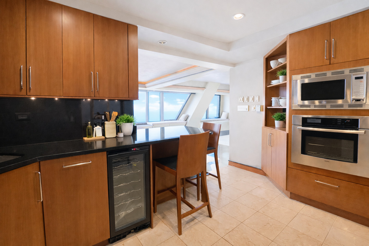 175 East Delaware Place, Unit 9007 Chicago, IL 60611 - Photo 17 of 27 a kitchen with a sink cabinets and stainless steel appliances