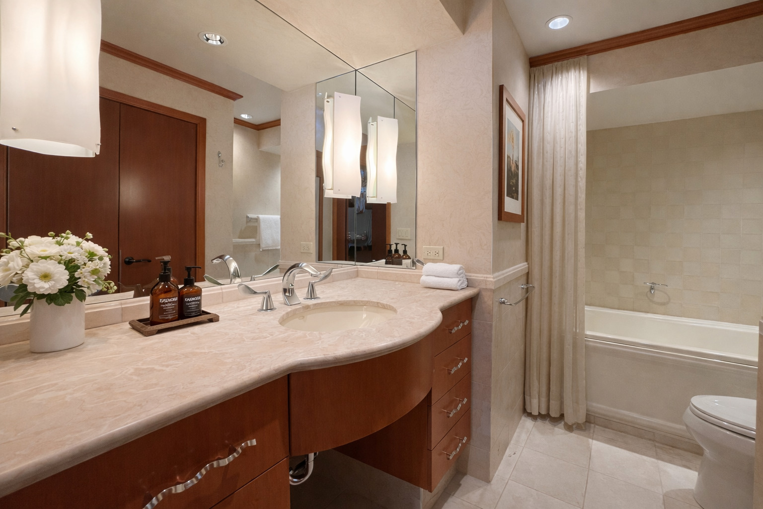 175 East Delaware Place, Unit 9007 Chicago, IL 60611 - Photo 18 of 27 a bathroom with a granite countertop sink and a mirror