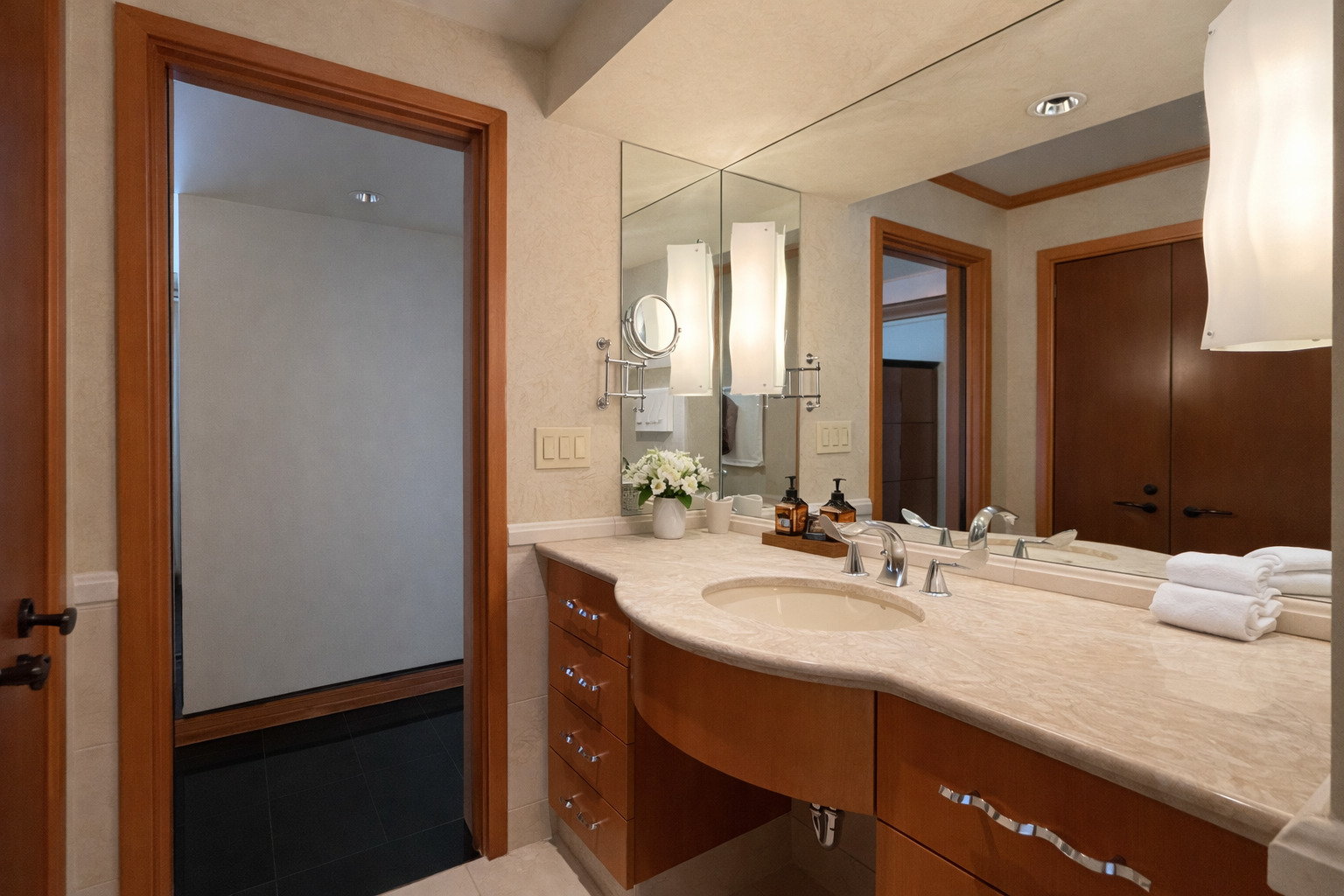 175 East Delaware Place, Unit 9007 Chicago, IL 60611 - Photo 19 of 27 a bathroom with a sink and a mirror