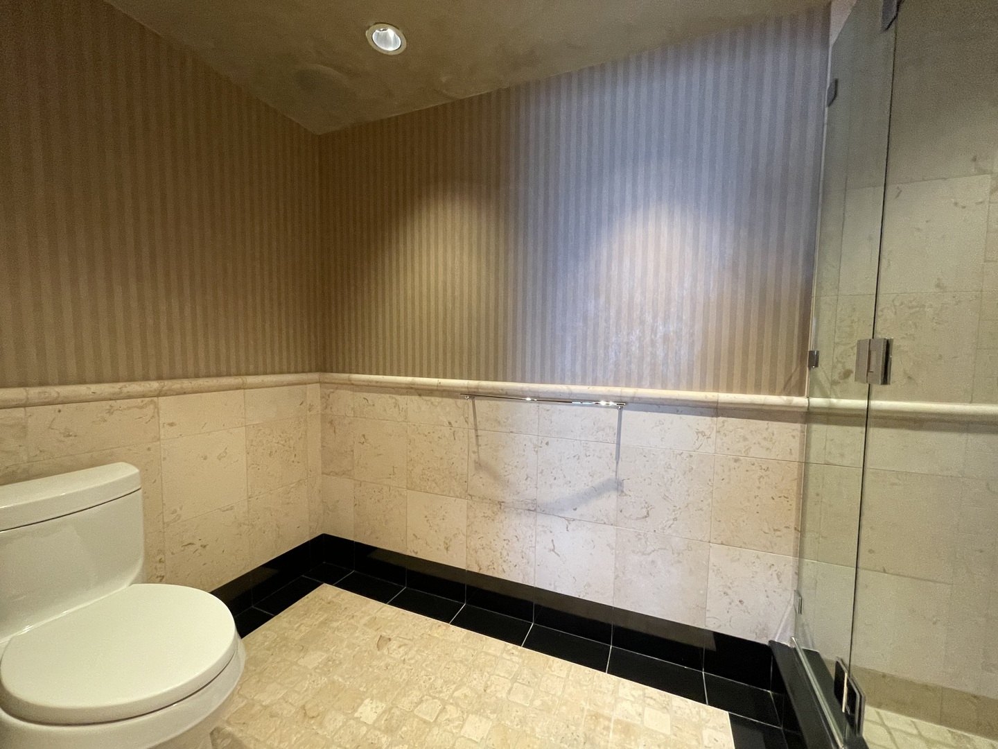 175 East Delaware Place, Unit 9007 Chicago, IL 60611 - Photo 22 of 29 a bathroom with a toilet a sink and a shower