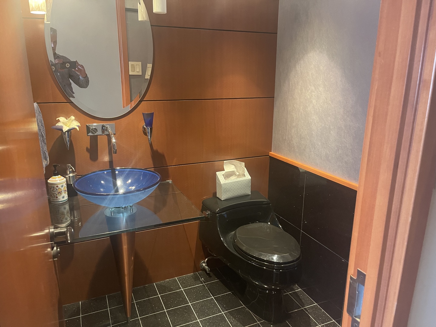 175 East Delaware Place, Unit 9007 Chicago, IL 60611 - Photo 25 of 29 a bathroom with a toilet and a mirror