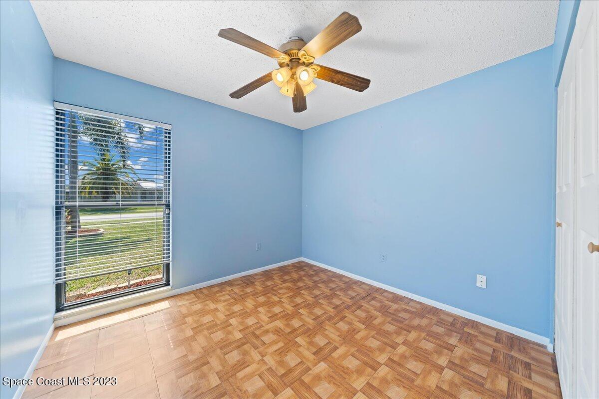 1379 Cromey Road Northeast Palm Bay, FL 32905 - Photo 15 of 25 a view of an empty room and window