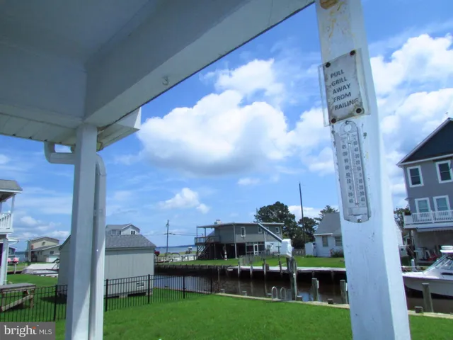a view of roof with sitting area
