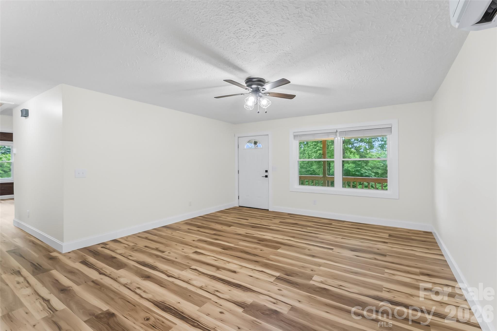 825 South Creek Road Nebo, NC 28761 - Photo 10 of 34 a view of an empty room with a window
