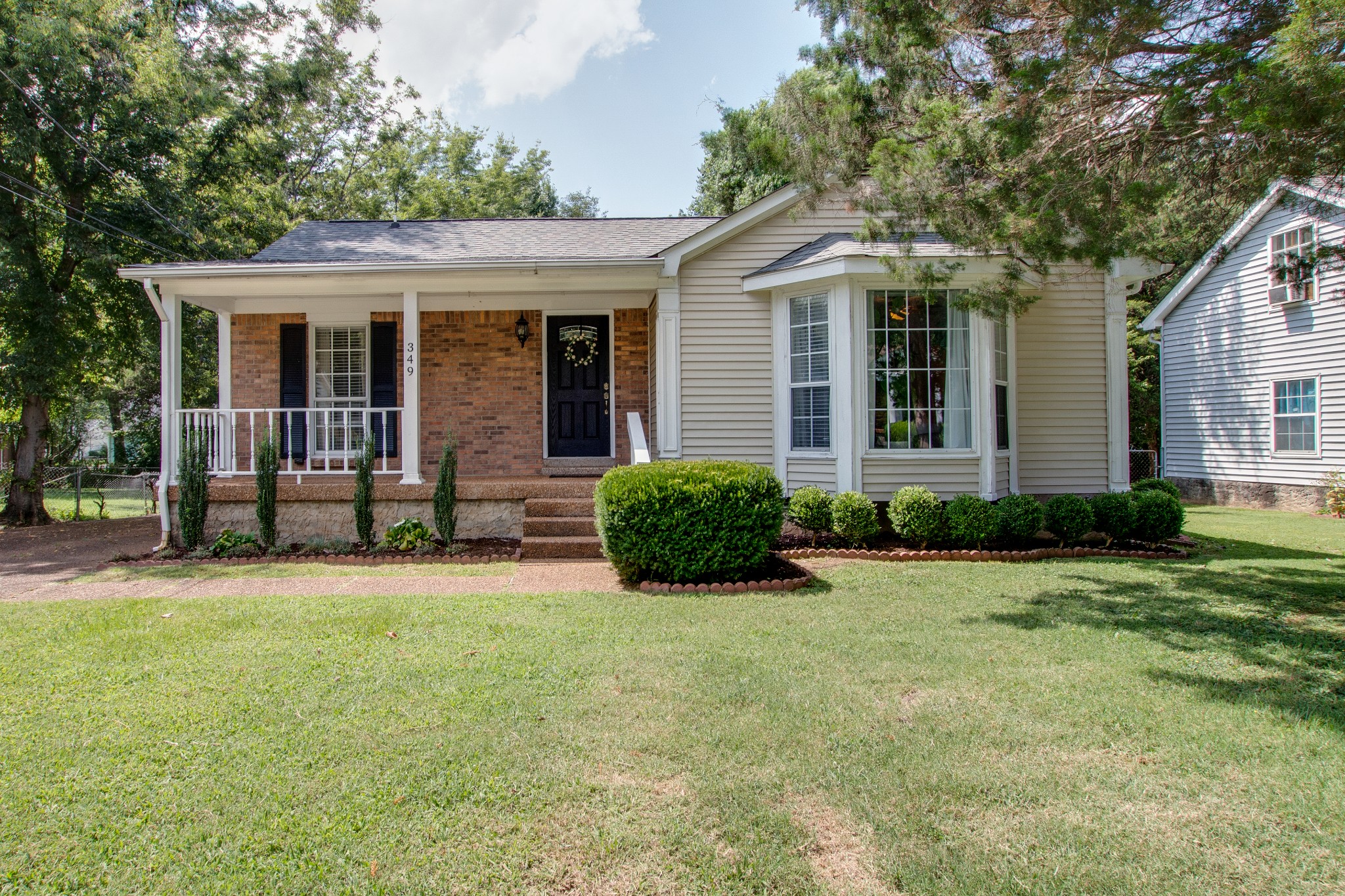 349 Cedarcliff Road Antioch, TN 37013 - Photo 1 of 27 front view of a house with a yard