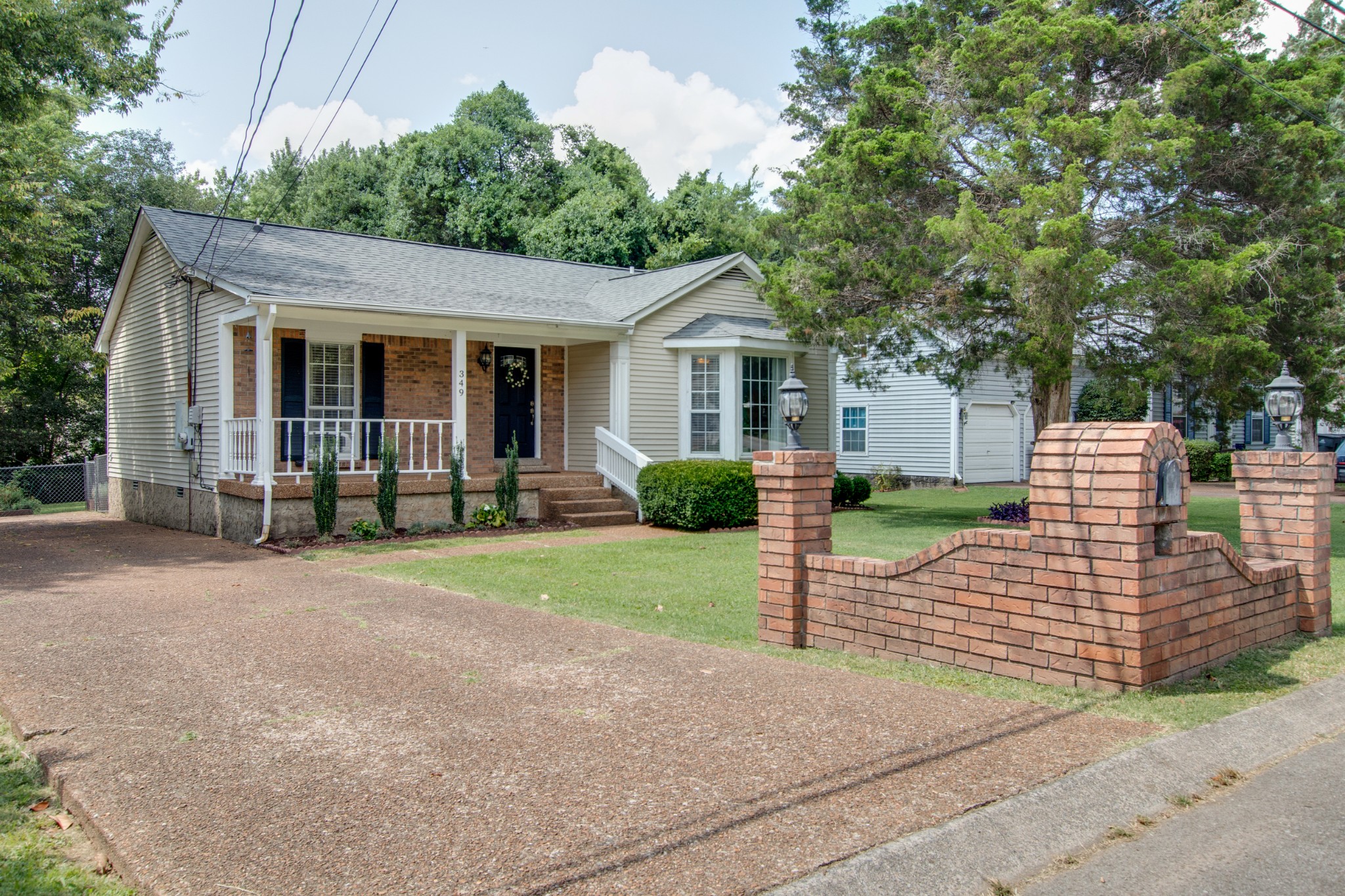 349 Cedarcliff Road Antioch, TN 37013 - Photo 2 of 27 a view of a house with a yard and plants