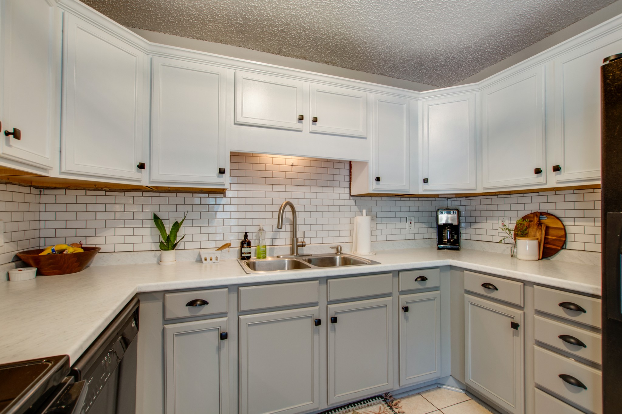 349 Cedarcliff Road Antioch, TN 37013 - Photo 14 of 27 a kitchen with stainless steel appliances white cabinets and a sink
