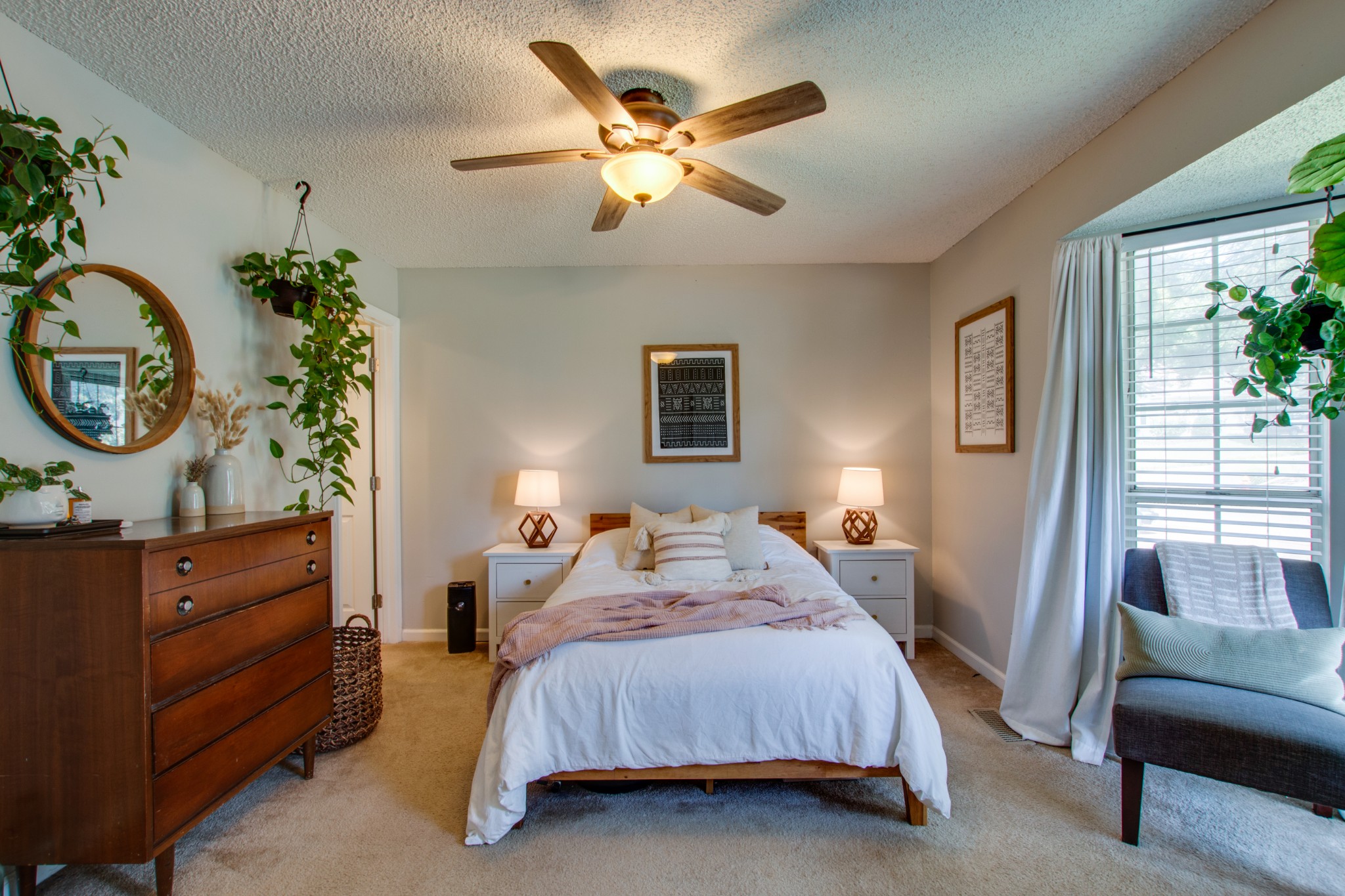 349 Cedarcliff Road Antioch, TN 37013 - Photo 17 of 27 a bedroom with a bed and a chandelier