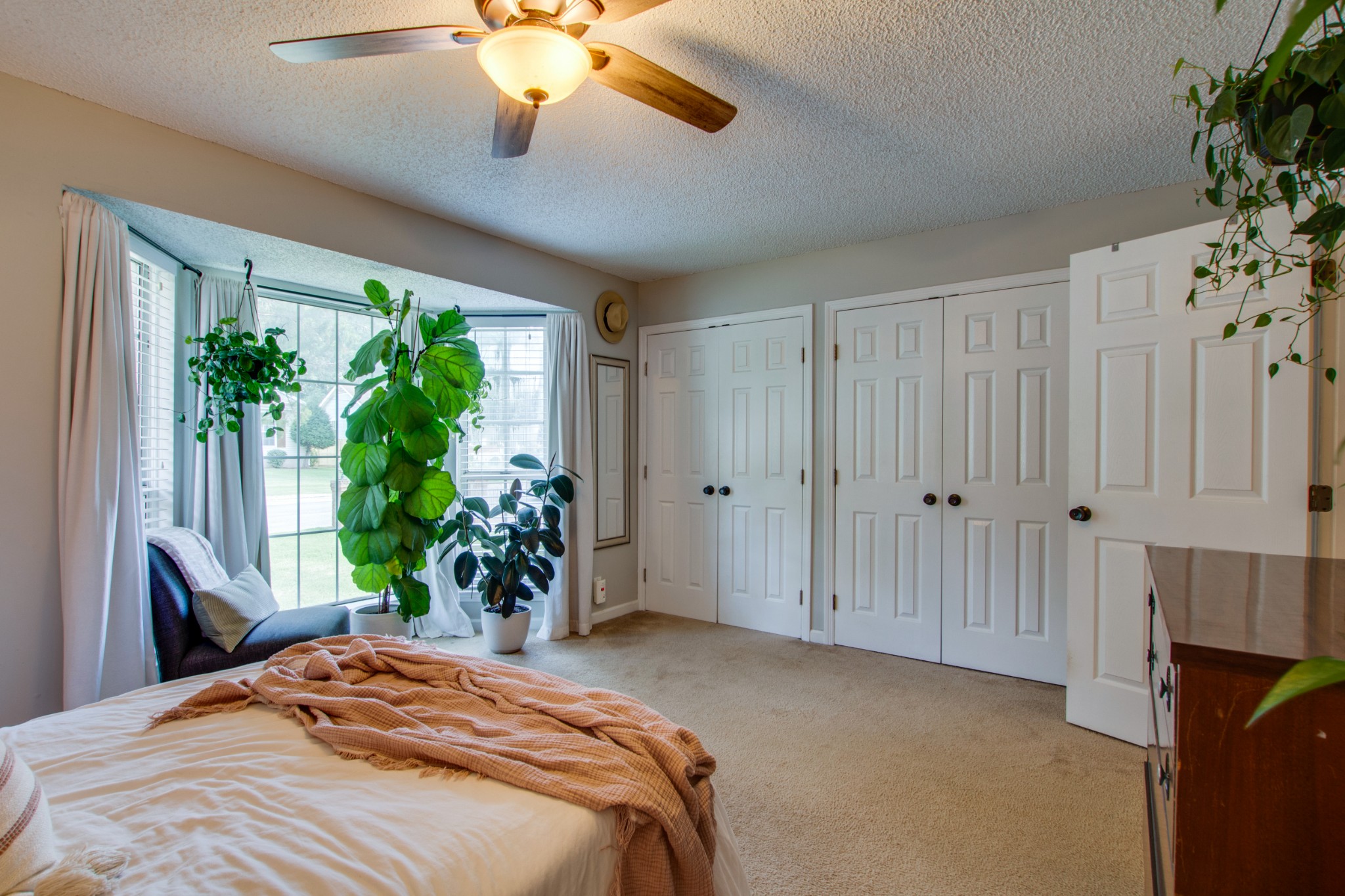 349 Cedarcliff Road Antioch, TN 37013 - Photo 18 of 27 a bedroom with a bed and a potted plant