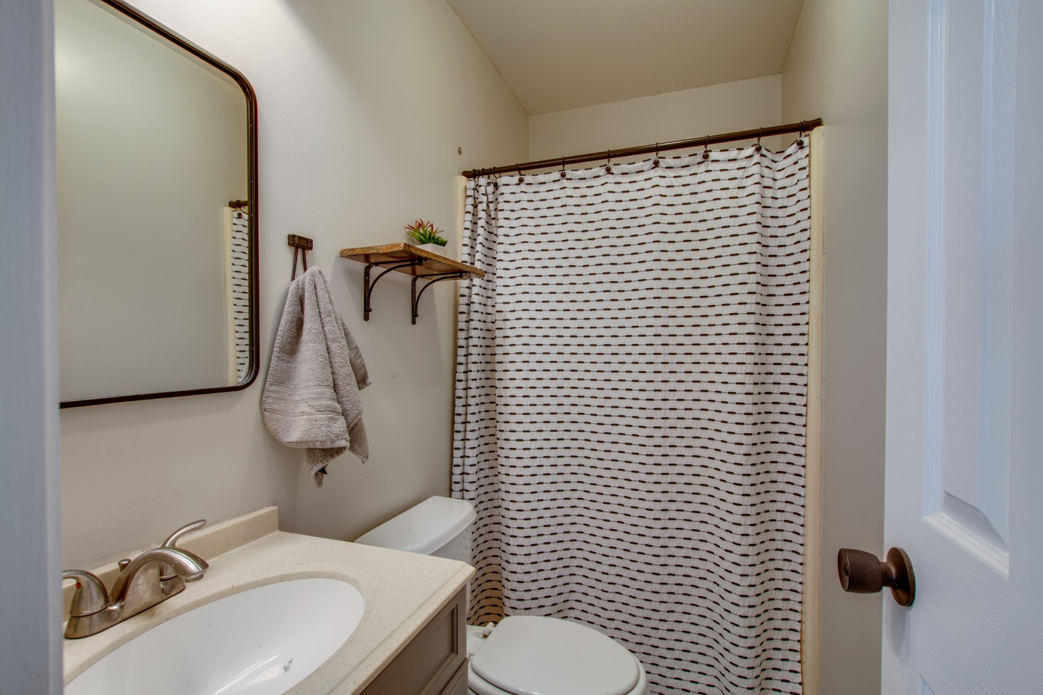 349 Cedarcliff Road Antioch, TN 37013 - Photo 19 of 27 a bathroom with a sink toilet and shower