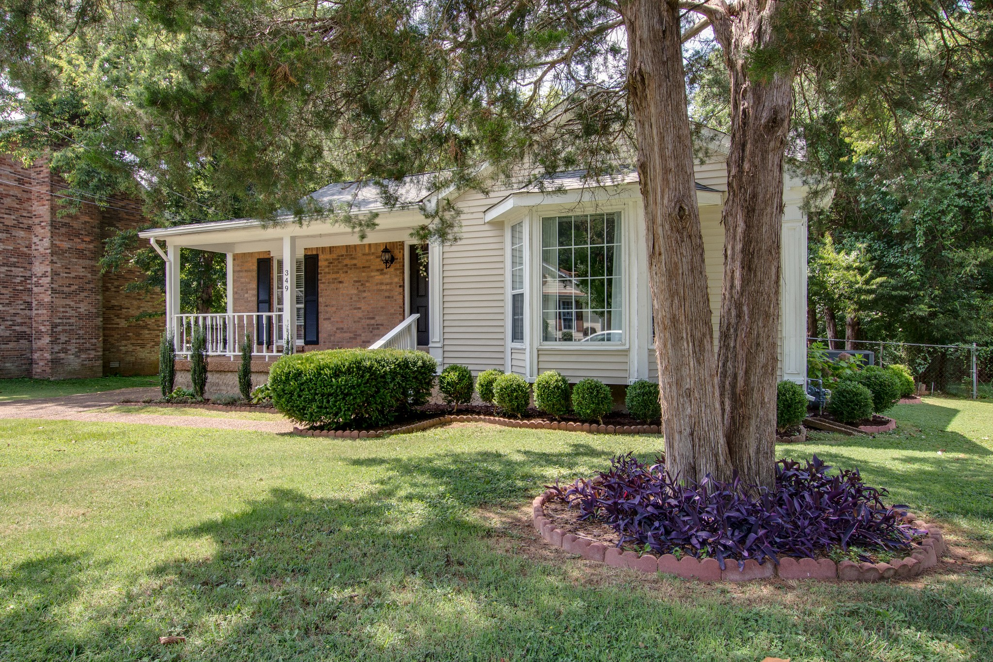 349 Cedarcliff Road Antioch, TN 37013 - Photo 27 of 27 a front view of a house with garden