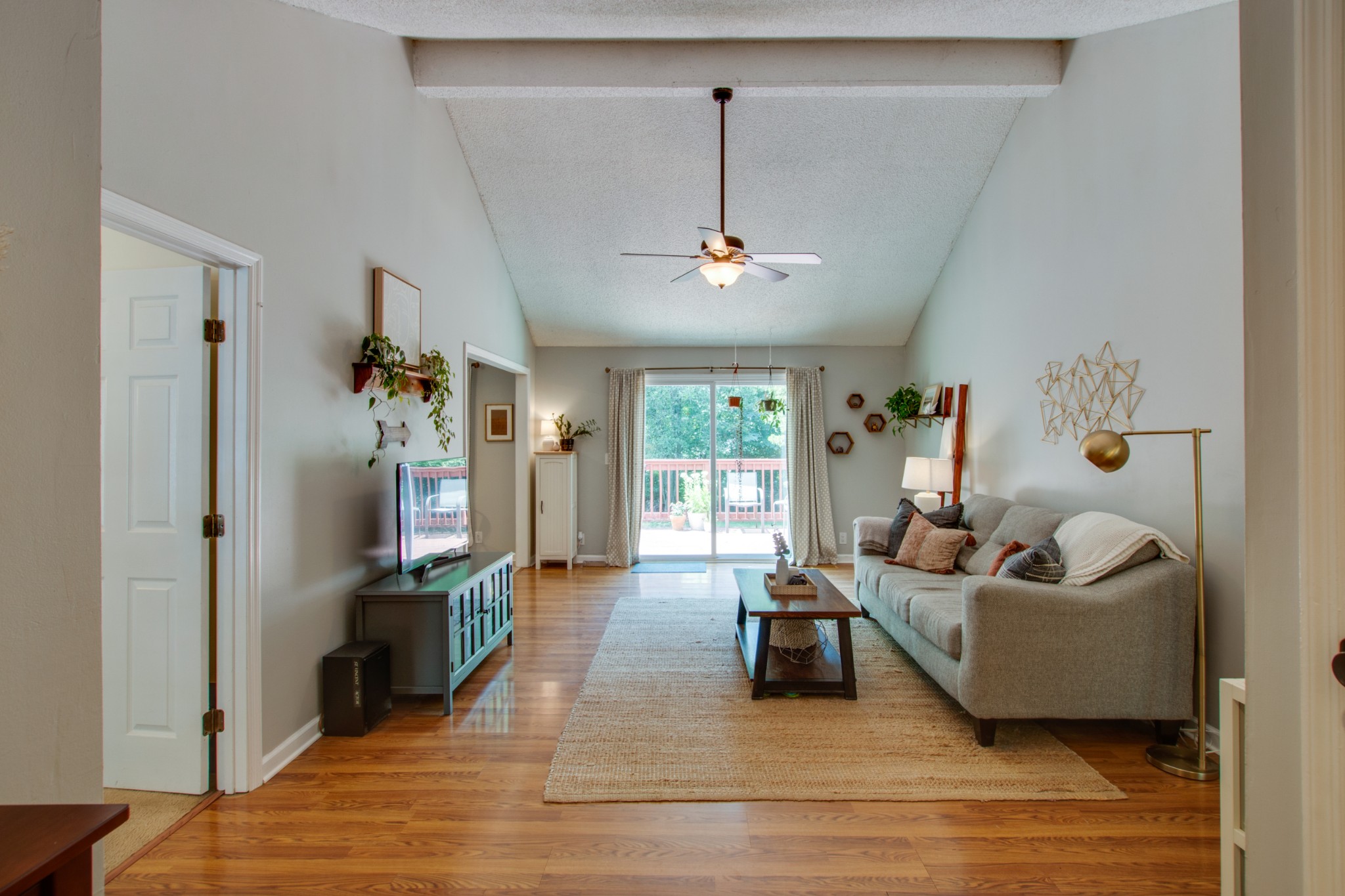 349 Cedarcliff Road Antioch, TN 37013 - Photo 6 of 27 a living room with furniture and a chandelier