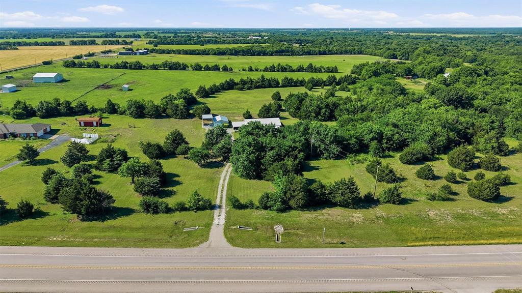 15656 South State Highway 78 Blue Ridge, TX 75424 - Photo 2 of 36 an aerial view of a residential houses with outdoor space and trees