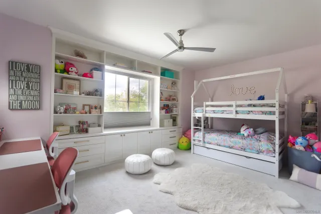 a room with furniture and a fireplace