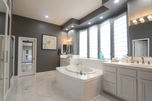 a kitchen with sink stove and refrigerator