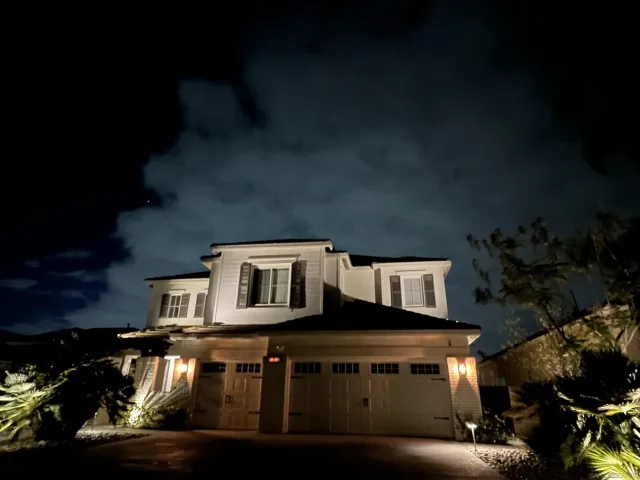 a front view of a house with yard