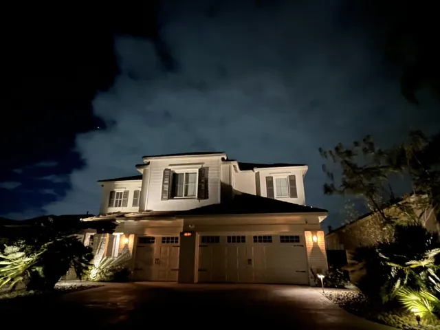 a front view of a house with yard