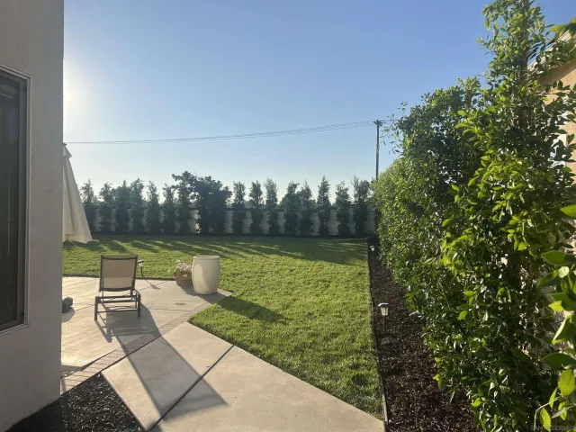 a view of swimming pool with chairs