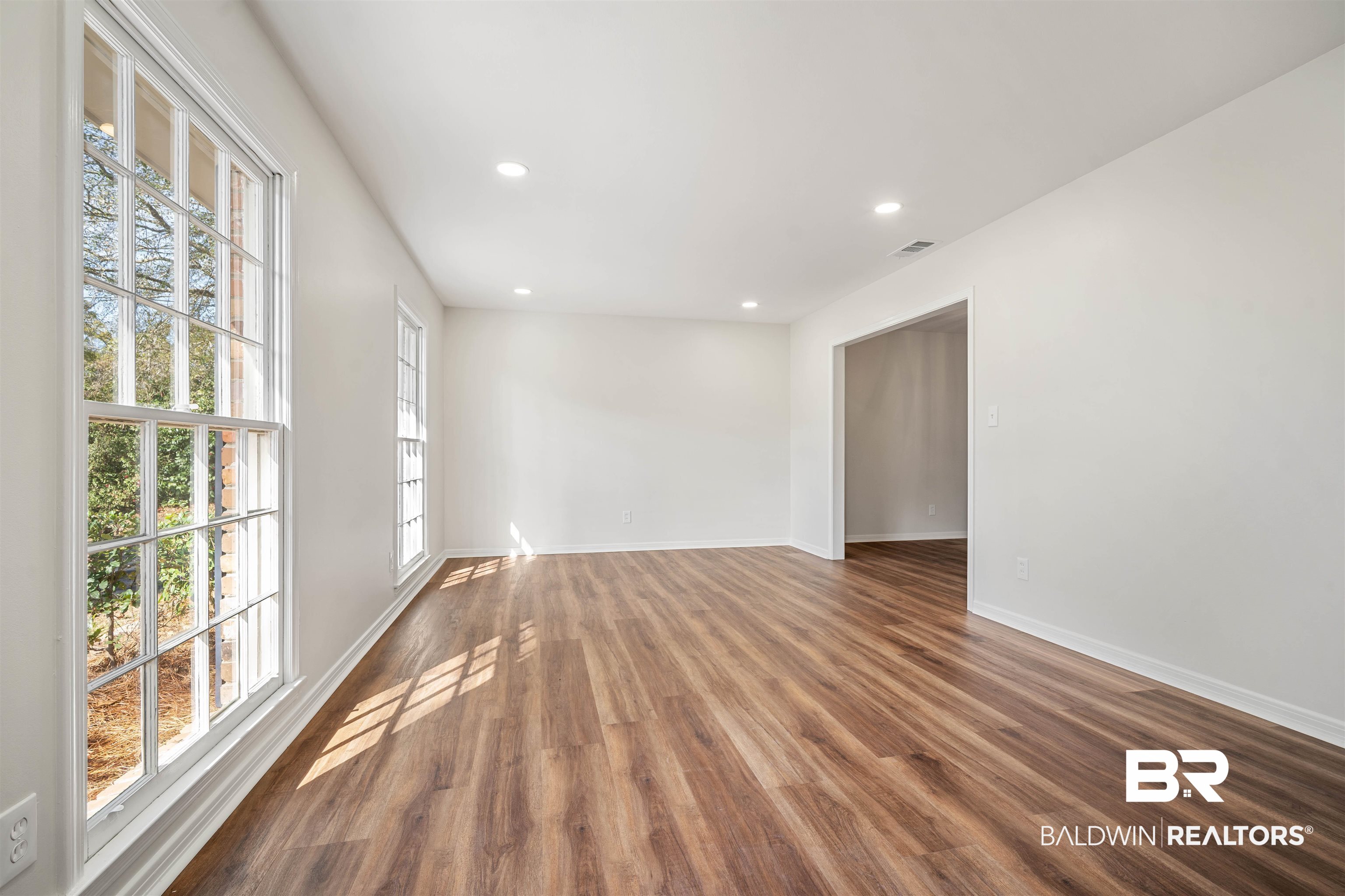 860 Montfort Road South Mobile, AL 36608 - Photo 14 of 27 Unfurnished room with recessed lighting and wood finished floors