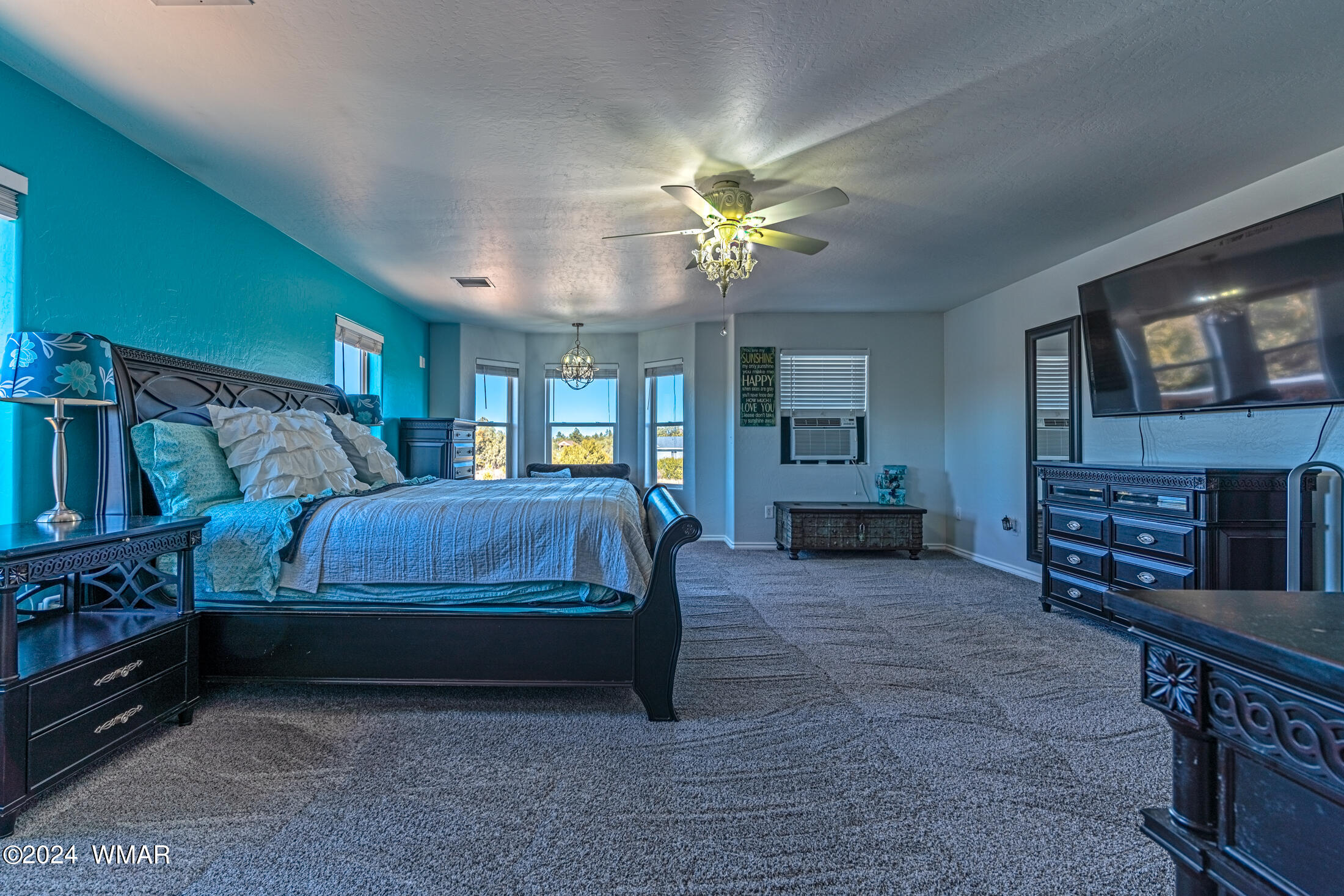 1108 Pearce Road Show Low, AZ 85901 - Photo 25 of 51 a bed room with a bed and a chair
